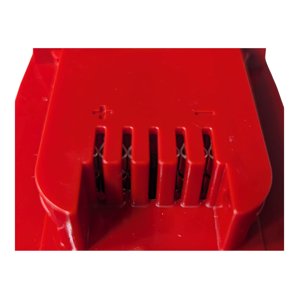 Craftsman 20V to Milwaukee M18 battery adapter - close-up of the Milwaukee tool-side slots with + and - polarity marks