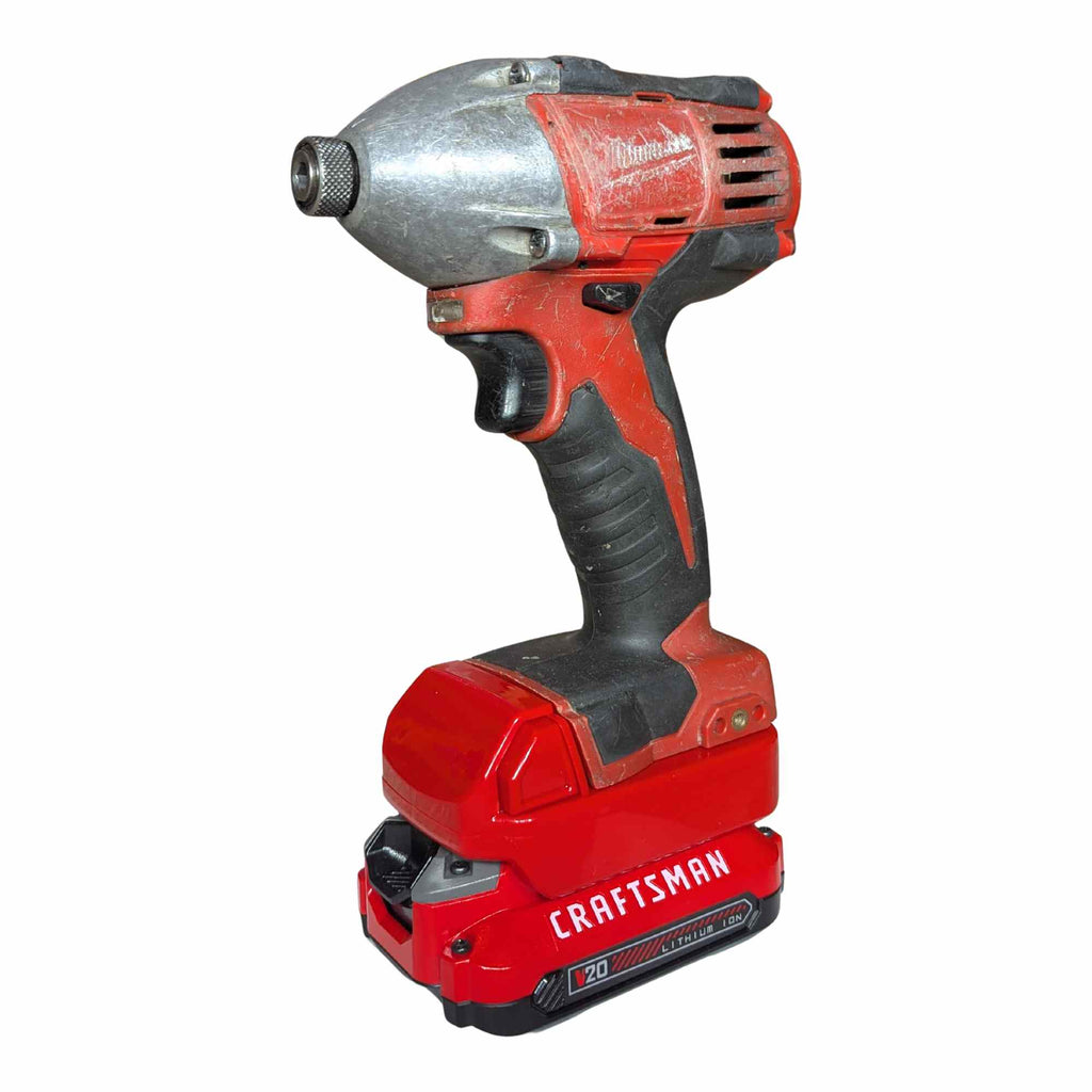 Craftsman 20V to Milwaukee M18 battery adapter - impact driver installed on the adapter above the battery