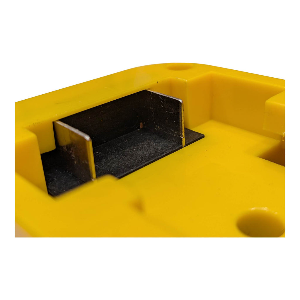 DeWalt 20V MAX to Porter Cable 20V battery adapter - close-up of a copper blade in the battery-side channel