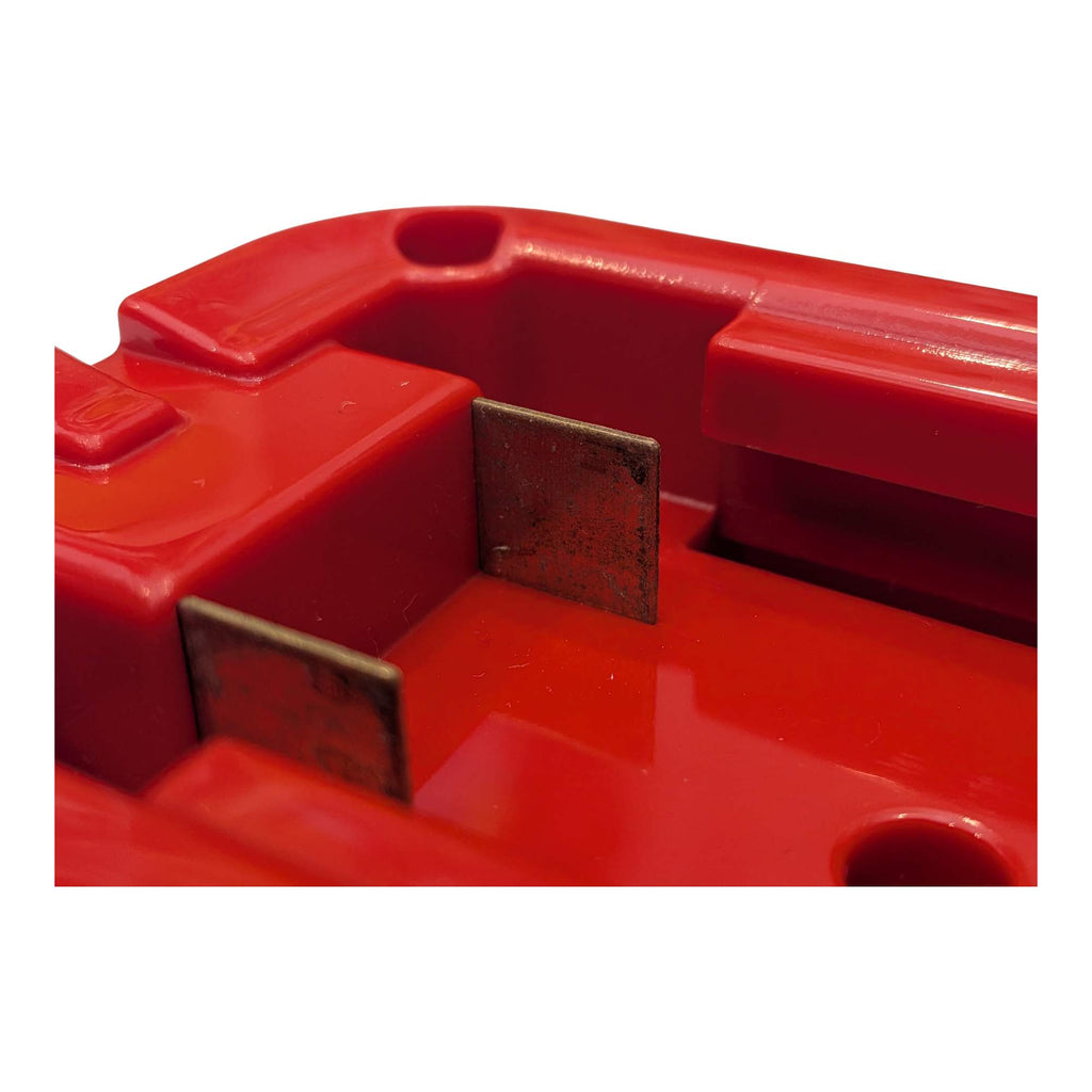 Milwaukee M18 to DeWalt 20V MAX battery adapter - close-up of the copper blades in the battery-side channel