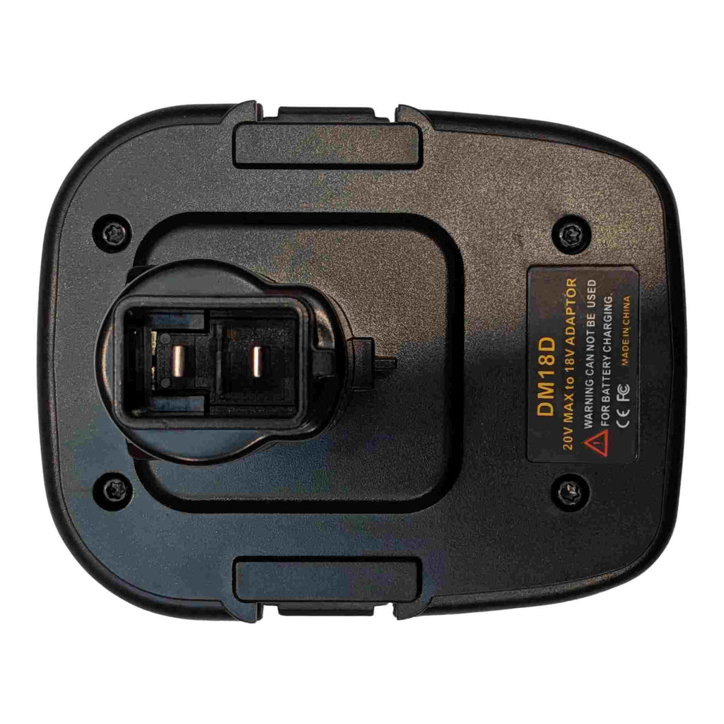 DeWalt 20V MAX to DeWalt 18V Ni-Cd battery adapter - tool-side terminal head from directly above, two contact openings