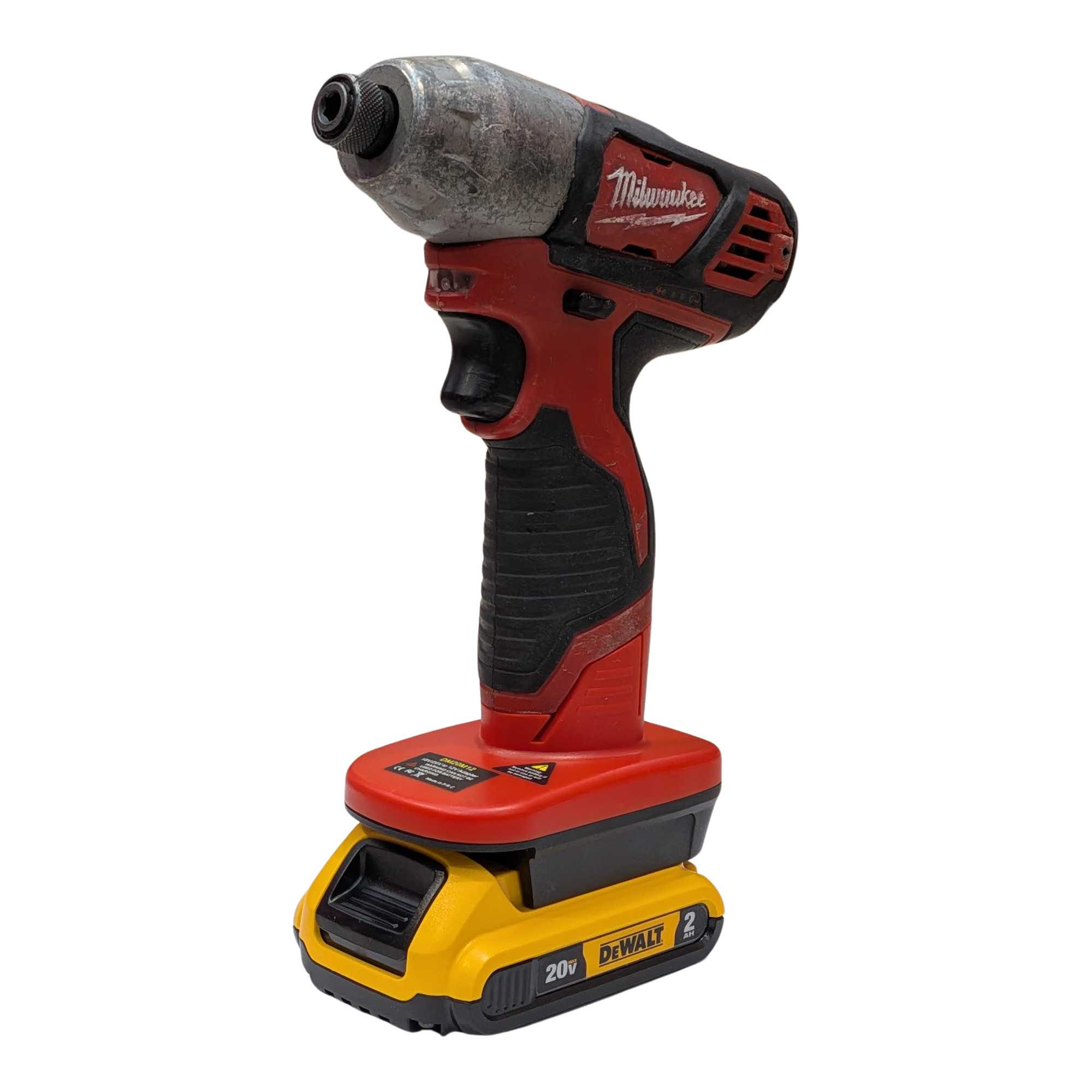 DeWalt 20V MAX to Milwaukee M12 battery adapter - front view installed on a Milwaukee impact driver, battery below