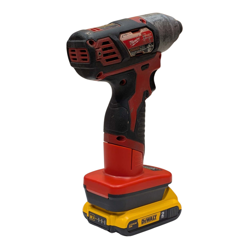 DeWalt 20V MAX to Milwaukee M12 battery adapter - rear view installed on a Milwaukee impact driver, battery below