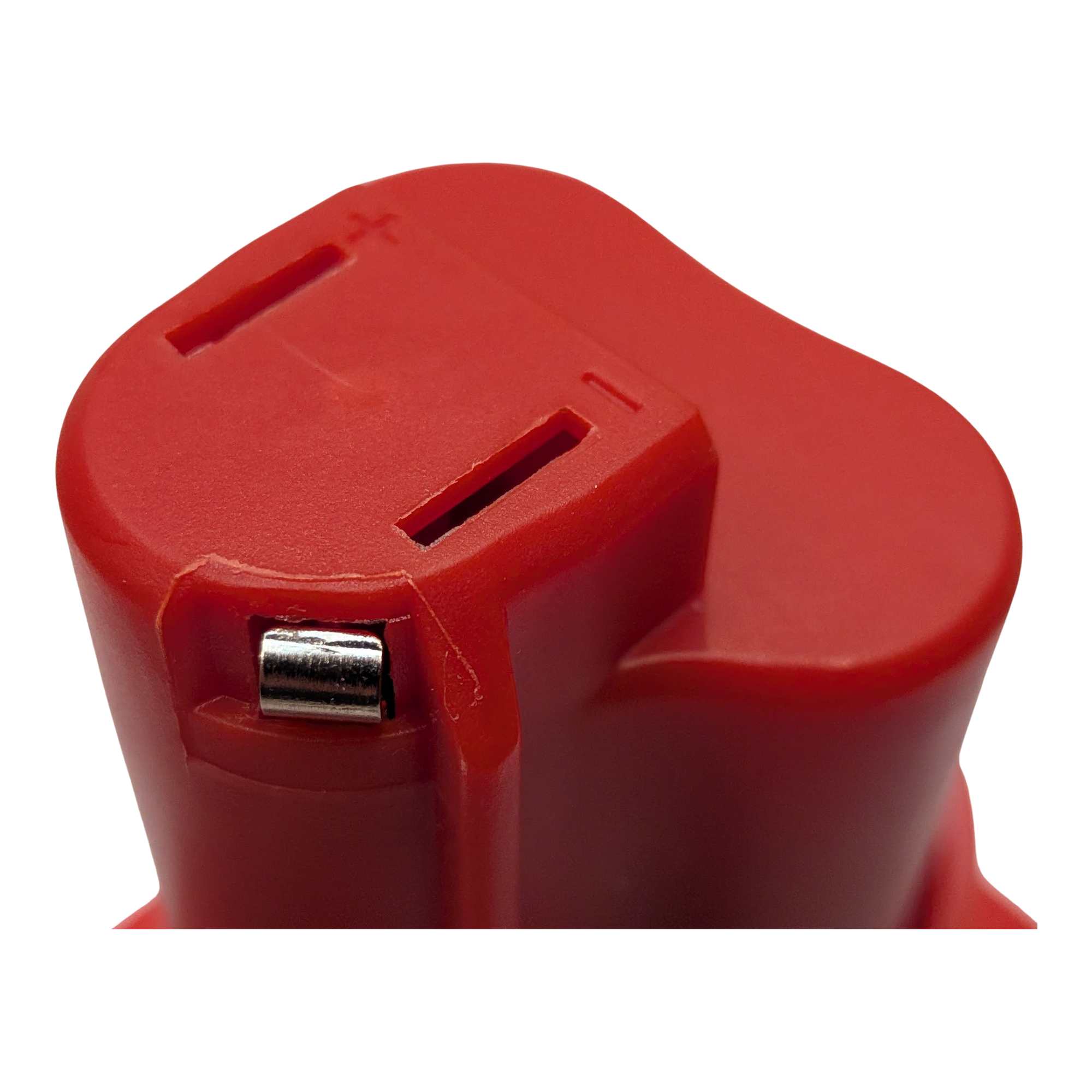 Milwaukee M18 to Milwaukee M12 battery adapter - close-up of the tool-side connection, terminal slots and polarity marks