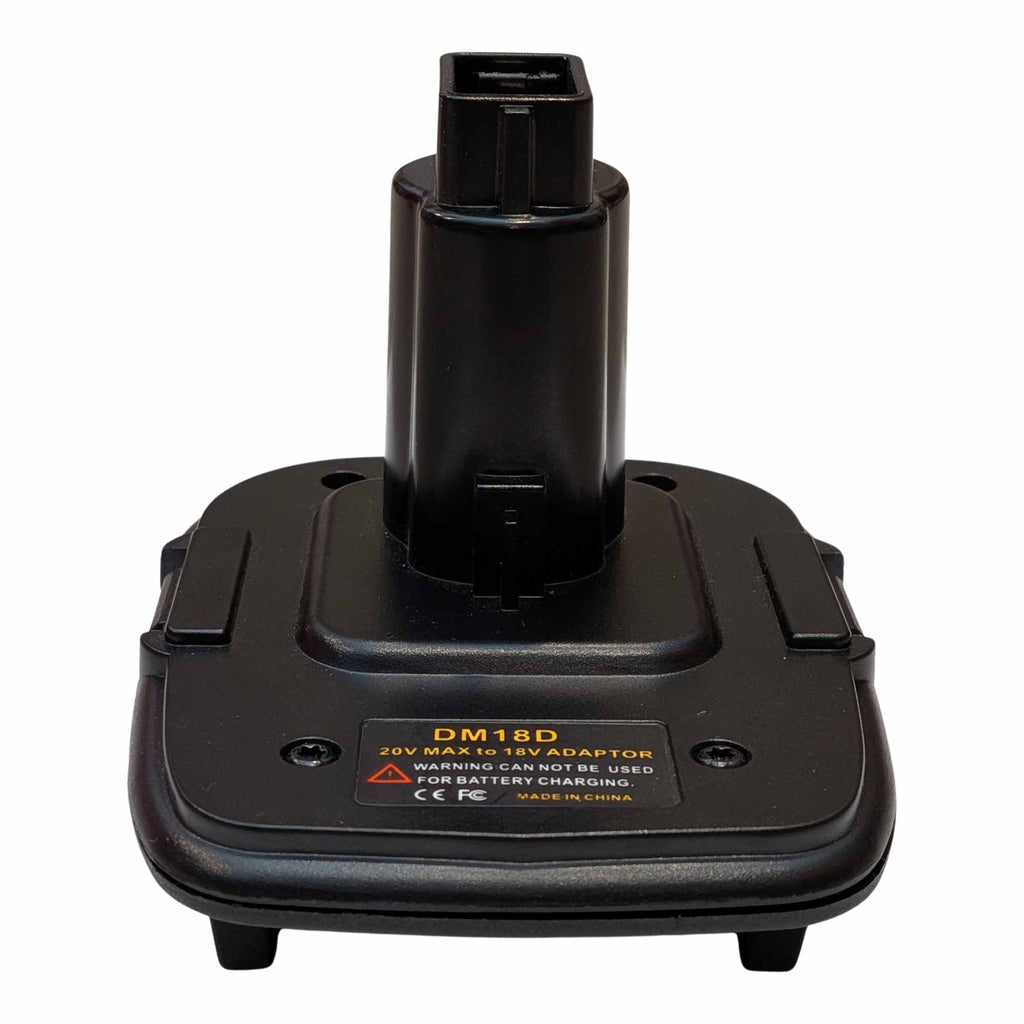 Milwaukee M18 to DeWalt 18V Ni-Cd battery adapter - front view, tool-side post rising from the body, warning label below