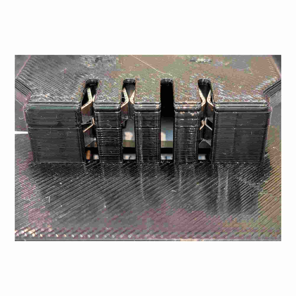 Milwaukee M18 to Earthquake 20V XT battery adapter - close-up of the Earthquake tool-side terminal block