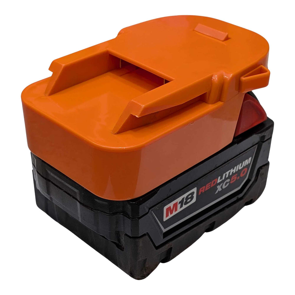 Milwaukee M18 to RIDGID 18V battery adapter - fitted to the Milwaukee M18 battery, tool-side rail and catch in view