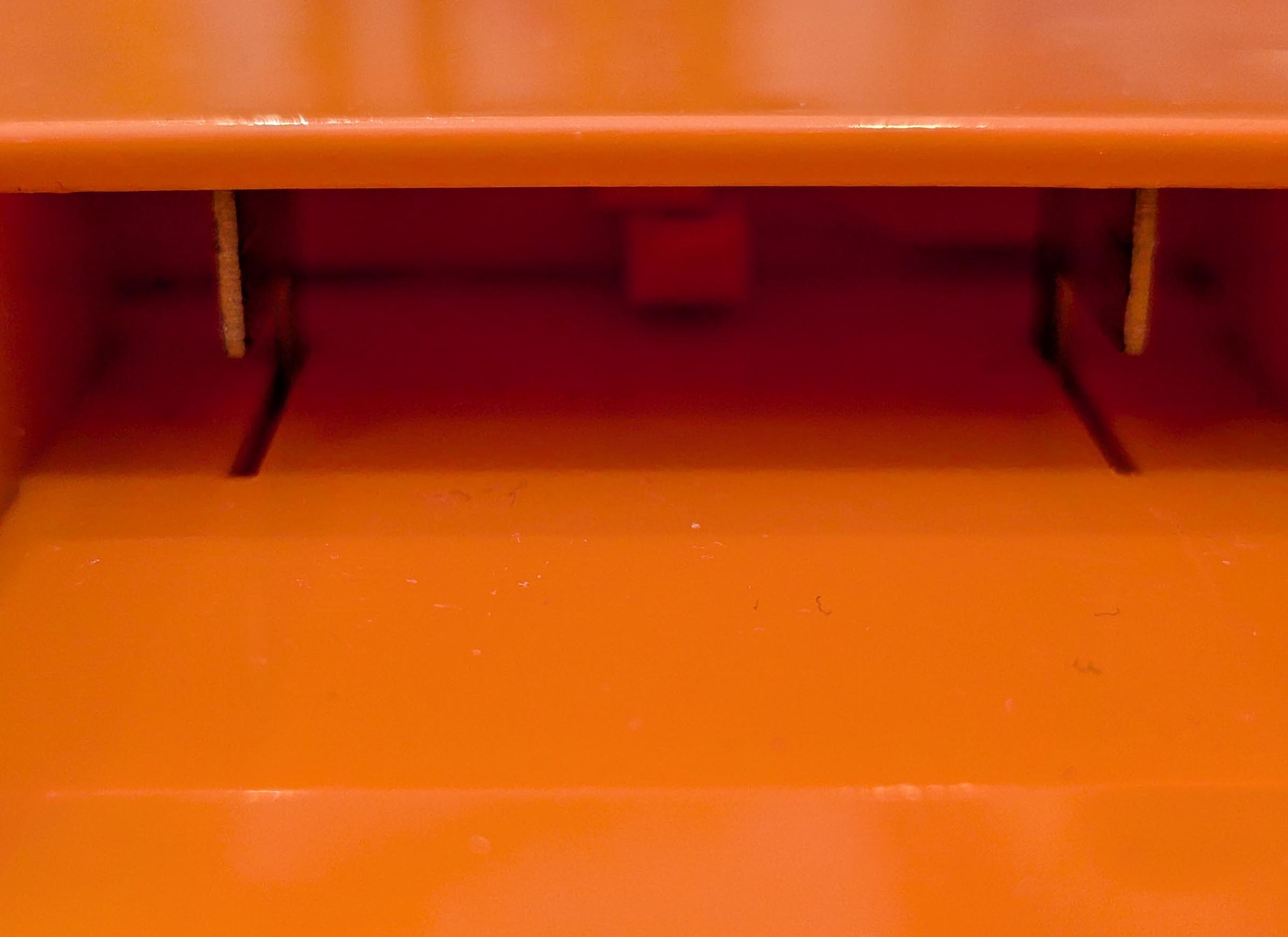 Milwaukee M18 to RIDGID 18V battery adapter - close-up of the spring contacts under the tool-side rail